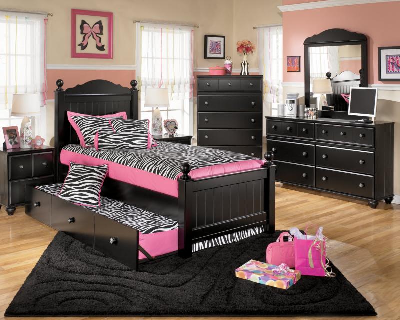 little girl room with black furniture