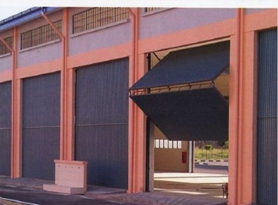 Home Folding Garage Doors Impressive On Home Intended Bi Designs