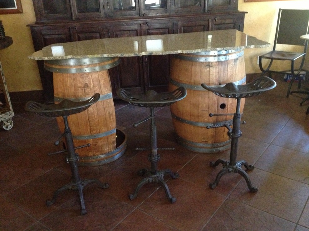 A Rustic Vintage Looking Dining Table With Wine Barrel Legs